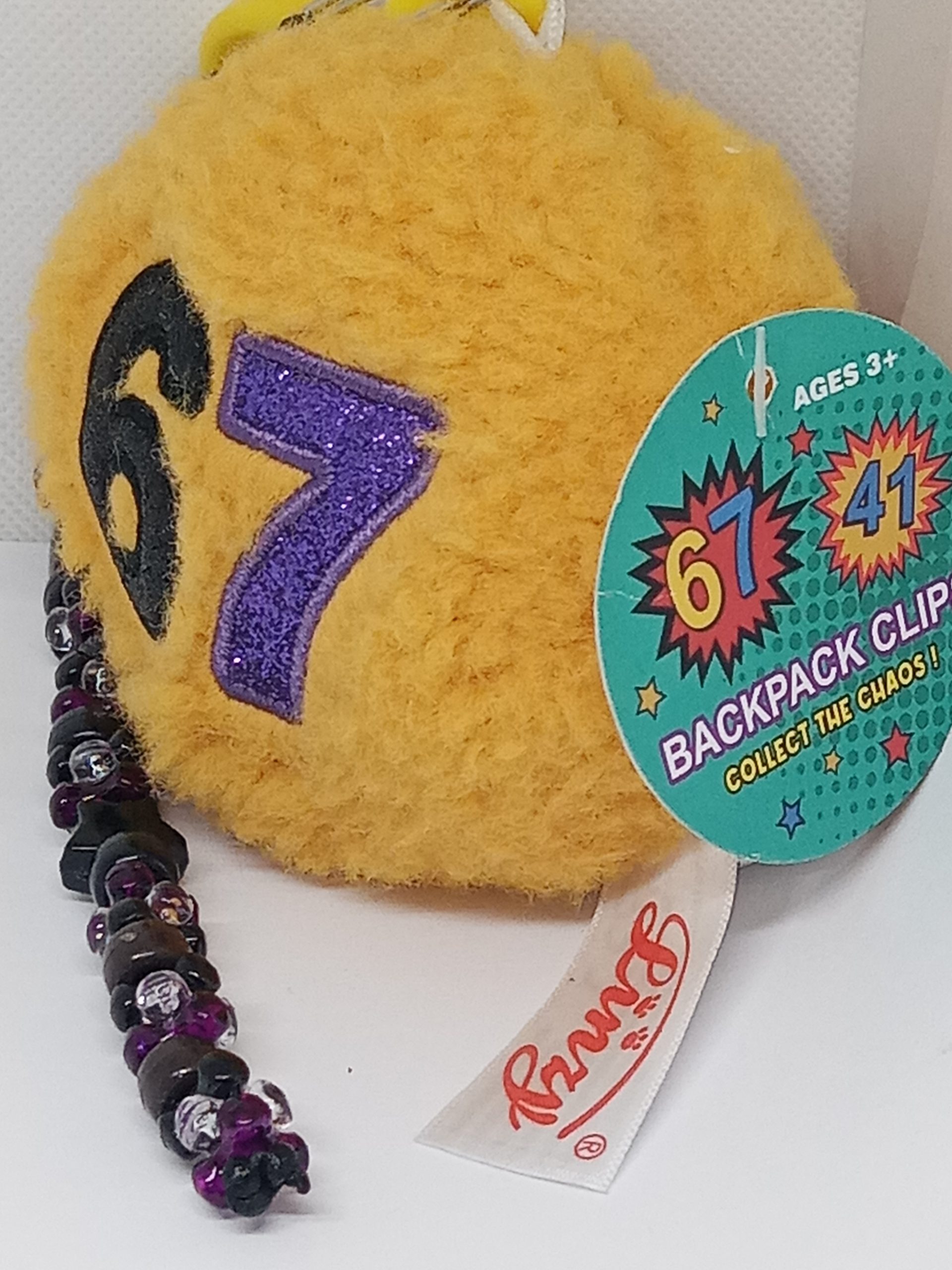 side view of 67 plush keychain