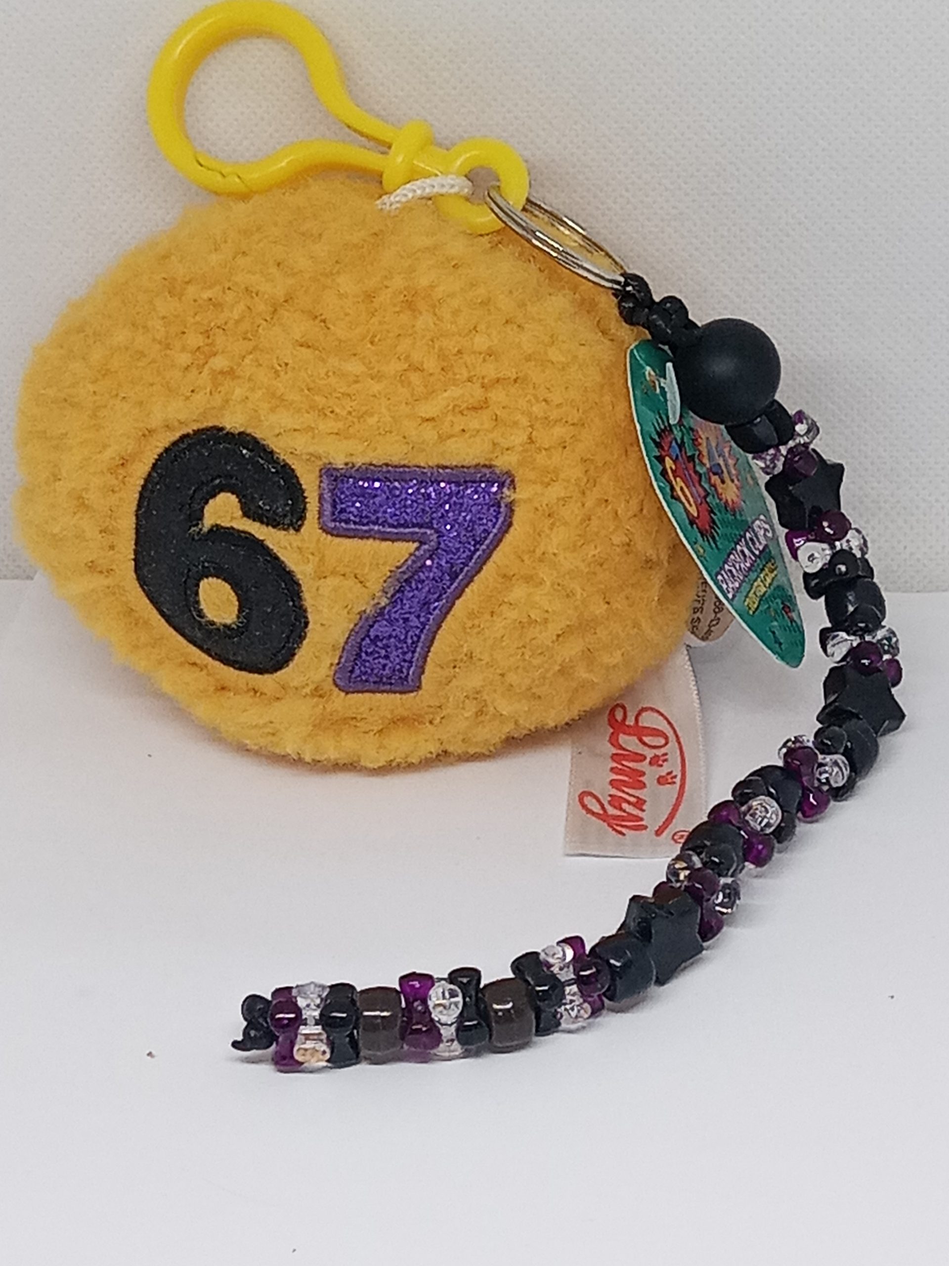 Number 67 plush backpack clip