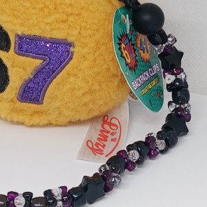 Handmade beaded dangle attached to plush keychain