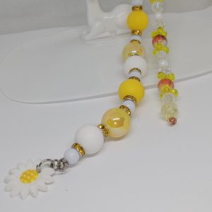 Yellow and white beads with gold-tone spacer details