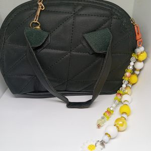 Yellow beaded bag charm with white daisy dangle